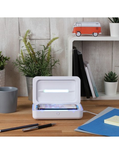 Livoo TEA256 UV sterilizer on desk with smartphone and blue LED indicator