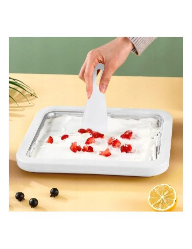 Rolled ice cream ready on the pan