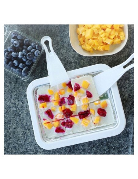 Rolled ice cream squares with fruit toppings